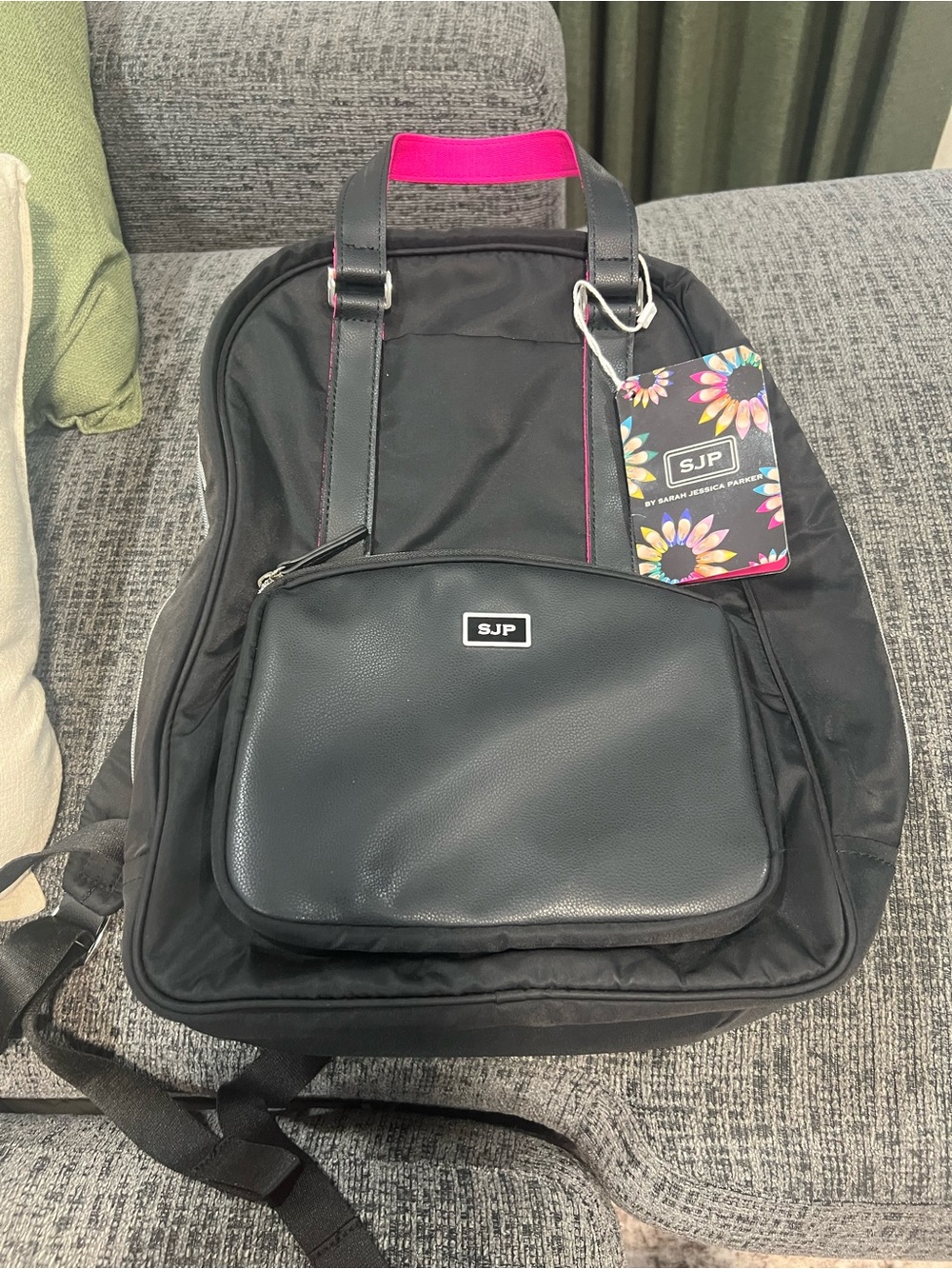 SJP by Sarah Jessica Parker Black Backpack with Pink Handle Accent